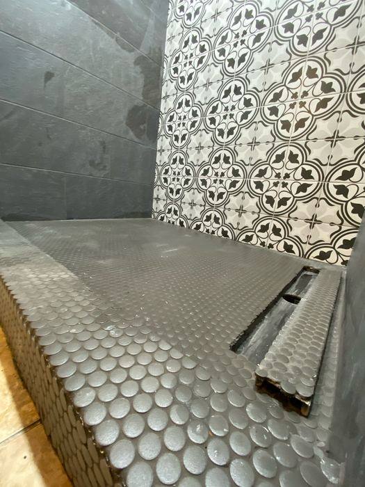 Penny-tile curb and linear drain