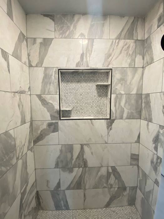 Shower niche with penny-tile inset